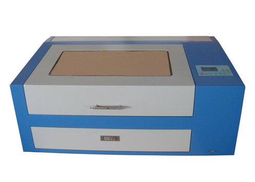 ماكينة عمل الأختام والحفر بالليزر